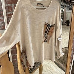 Designer inspired long sleeve baggy top great over leggings or jeans.